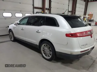 2013 Lincoln MKT EcoBoost with VIN 2LMHJ5AT3DBL56954, listed as a IAAI auction lot 41705877 with 148,771 mi miles. Bid and sale history available at carsss.com. Image 3.