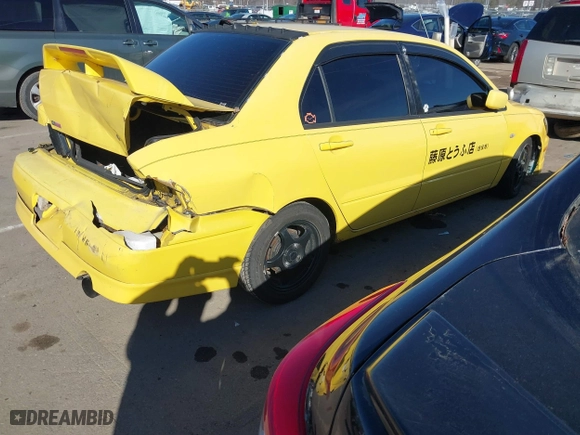 2003 Mitsubishi Lancer OZ-Rally with VIN JA3AJ86E23U079315, listed as a IAAI auction lot 41408040 with 130,356 mi miles. Bid and sale history available at carsss.com. Image 4.