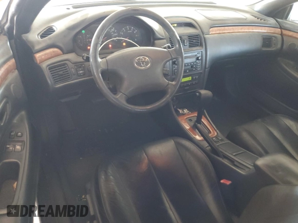 2002 Toyota Solara SE with VIN 2T1FF28PX2C580985, listed as a Copart auction lot 83092354 with 264,668 mi miles and Salvage Title. Bid and sale history available at DreamBid. Image 8.