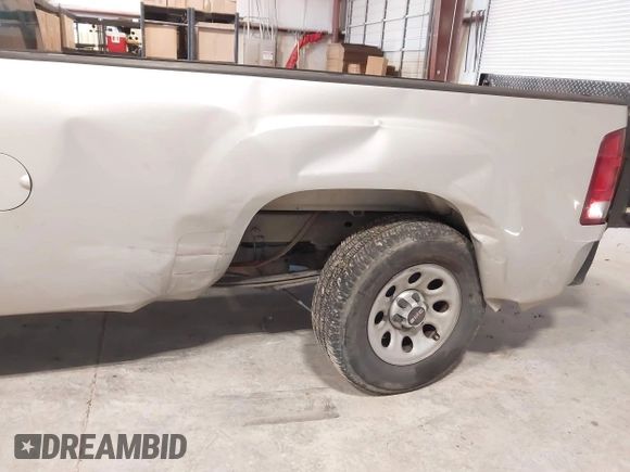 2011 GMC Sierra 1500 Work Truck z VIN 1GTN1TE09BZ409111, wystawiony jako IAAI lot #41598391 z przebiegiem 125 747 mil mil oraz . Historia ofert i sprzedaży dostępna na DreamBid. Obrazek 6.