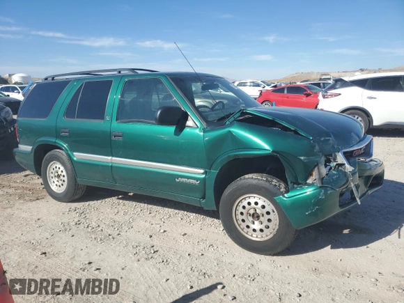2000 GMC Jimmy SLE Convenience z VIN 1GKDT13W3Y2215035, wystawiony jako Copart lot #77484104 z przebiegiem 116 124 mil mil oraz Szkoda całkowita • Salvage title. Historia ofert i sprzedaży dostępna na DreamBid. Obrazek 4.