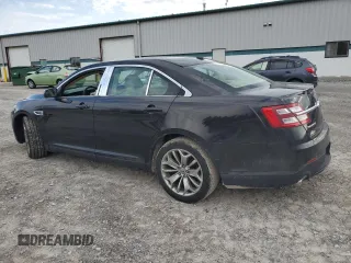 2014 Ford Taurus Limited z VIN 1FAHP2F85EG151167, wystawiony jako Copart lot #54376275 z przebiegiem 136 612 mil mil oraz Szkody całkowita. Historia ofert i sprzedaży dostępna na DreamBid. Obrazek 2.