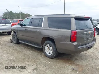 2015 Chevrolet Suburban LT z VIN 1GNSCJKC6FR675585, wystawiony jako IAAI lot #41510570 z przebiegiem 156 818 mil mil oraz . Historia ofert i sprzedaży dostępna na DreamBid. Obrazek 3.