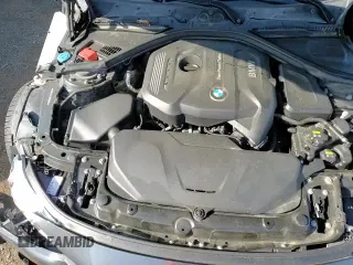 2018 BMW 3 Series 330i xDrive with VIN WBA8D9C54JEM34264, listed as a Copart auction lot 63007265 with 84,071 mi miles and Salvage title. Bid and sale history available at DreamBid. Image 14.