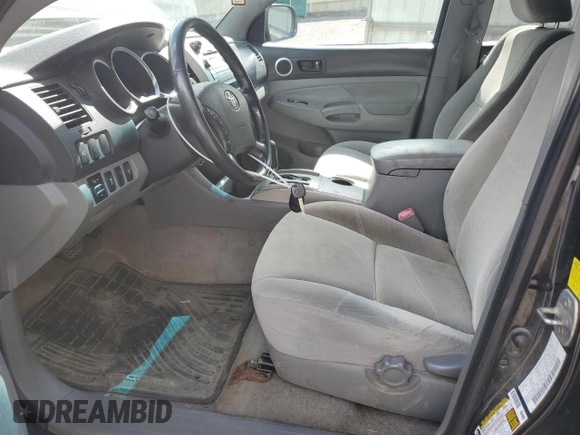2010 Toyota Tacoma with VIN 3TMLU4EN0AM052885, listed as a Copart auction lot 65341975 with 270,149 mi miles and Clean title. Bid and sale history available at DreamBid. Image 7.