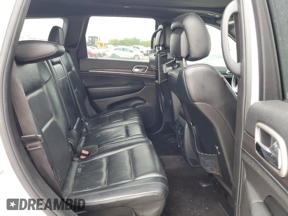 2018 Jeep Grand Cherokee Limited z VIN 1C4RJEBG5JC130674, wystawiony jako Copart lot #53908235 z przebiegiem 138 084 mil mil oraz Szkoda całkowita • Salvage title. Historia ofert i sprzedaży dostępna na DreamBid. Obrazek 11.