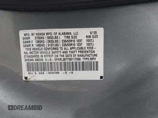 2005 Honda Odyssey EX-L z VIN 5FNRL38775B117598, wystawiony jako IAAI lot #42276239 z przebiegiem 184 134 mil mil oraz . Historia ofert i sprzedaży dostępna na DreamBid. Obrazek 9.