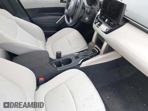 2023 Toyota Corolla Cross L with VIN 7MUAAABG4PV063424, listed as a IAAI auction lot 42119578 with 14,743 mi miles and . Bid and sale history available at DreamBid. Image 5.
