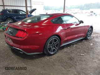 2018 Ford Mustang EcoBoost with VIN 1FA6P8TH7J5101309, listed as a IAAI auction lot 42211115 with 70,661 mi miles and . Bid and sale history available at DreamBid. Image 4.