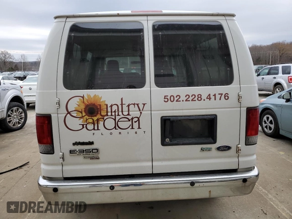 2009 Ford Econoline Passenger XL with VIN 1FBNE31L69DA54219, listed as a Copart auction lot 82971934 with 251,549 mi miles and Salvage title. Bid and sale history available at DreamBid. Image 6.
