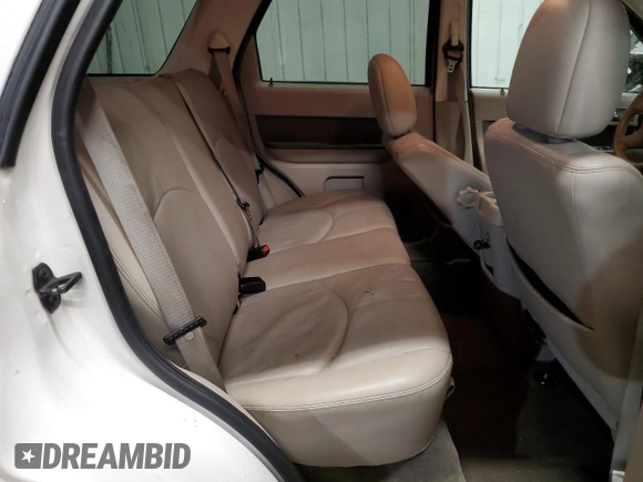 2009 Mercury Mariner Premier with VIN 4M2CU97749KJ15561, listed as a Copart auction lot 86042054 with 153,073 mi miles and Salvage Title. Bid and sale history available at carsss.com. Image 11.