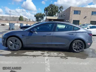 2023 Tesla Model 3 with VIN 5YJ3E1EA0PF698076, listed as a IAAI auction lot 41744362 with 12,838 mi miles. Bid and sale history available at carsss.com. Image 15.