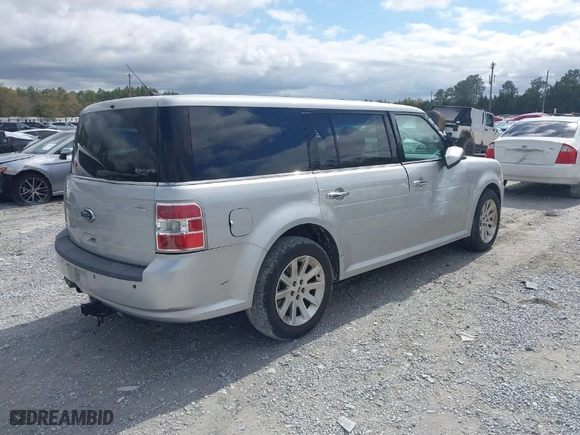 2009 Ford Flex SEL with VIN 2FMDK52C49BA04785, listed as a IAAI auction lot 41763652 with 142,877 mi miles. Bid and sale history available at carsss.com. Image 4.