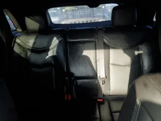 2022 Cadillac XT5 FWD Luxury z VIN 1GYKNAR49NZ159814, wystawiony jako Copart lot #74506584 z przebiegiem 7 069 mil mil oraz Nie do naprawy • Non repairable. Historia ofert i sprzedaży dostępna na DreamBid. Obrazek 10.