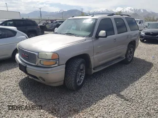 2004 GMC Yukon Denali z VIN 1GKEK63U14J196021, wystawiony jako Copart lot #53105945 z przebiegiem 191 214 mil mil oraz Szkoda całkowita • Salvage title. Historia ofert i sprzedaży dostępna na DreamBid. Obrazek 1.