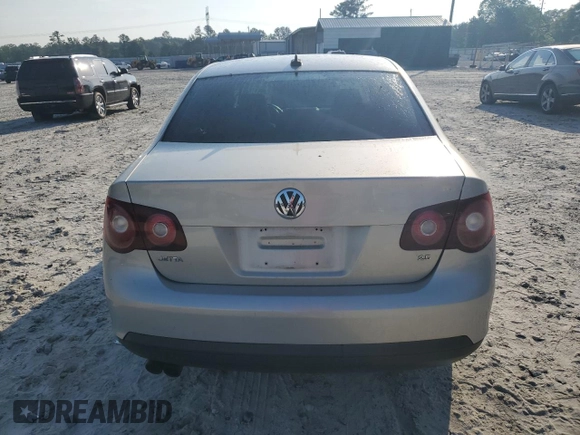 2010 Volkswagen Jetta SE with VIN 3VWRX7AJ1AM048637, listed as a Copart auction lot 57045965 with 158,297 mi miles and Salvage title. Bid and sale history available at DreamBid. Image 6.