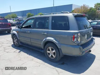 2007 Honda Pilot EX-L with VIN 5FNYF18587B015655, listed as a IAAI auction lot 42485193 with 293,684 mi miles and . Bid and sale history available at DreamBid. Image 3.