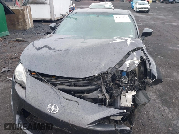 2014 Scion FR-S with VIN JF1ZNAA1XE9706469, listed as a IAAI auction lot 41942773 with 74,641 mi miles and . Bid and sale history available at DreamBid. Image 6.