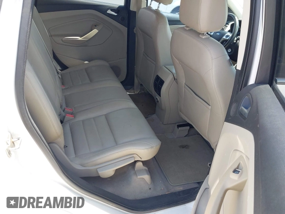 2013 Ford Escape SEL z VIN 1FMCU0H94DUD22476, wystawiony jako IAAI lot #42673808 z przebiegiem 215 811 mil mil oraz . Historia ofert i sprzedaży dostępna na DreamBid. Obrazek 8.