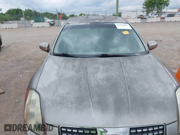 2004 Nissan Maxima SE with VIN 1N4BA41E74C858809, listed as a IAAI auction lot 42436562 with 198,105 mi miles and . Bid and sale history available at DreamBid. Image 12.