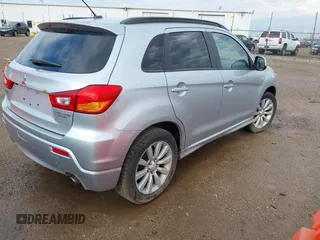 2011 Mitsubishi Outlander SE z VIN JA4AP4AU6BZ018195, wystawiony jako IAAI lot #41909830 z przebiegiem 68 576 mil mil oraz . Historia ofert i sprzedaży dostępna na DreamBid. Obrazek 4.