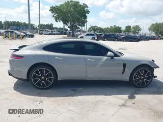2018 Porsche Panamera 4 E-Hybrid z VIN WP0AE2A7XJL174378, wystawiony jako IAAI lot #42303125 z przebiegiem 35 636 mil mil oraz . Historia ofert i sprzedaży dostępna na DreamBid. Obrazek 13.