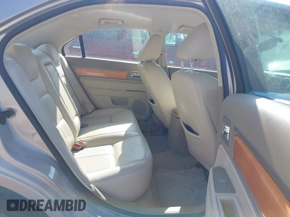 2009 Lincoln MKZ z VIN 3LNHM26TX9R617077, wystawiony jako IAAI lot #41983859 z przebiegiem 104 680 mil mil oraz . Historia ofert i sprzedaży dostępna na DreamBid. Obrazek 8.
