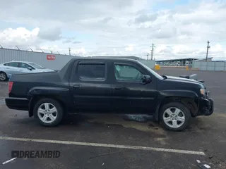2011 Honda Ridgeline RTL with VIN 5FPYK1F53BB001385, listed as a IAAI auction lot 41945219 with 168,713 mi miles and . Bid and sale history available at DreamBid. Image 13.