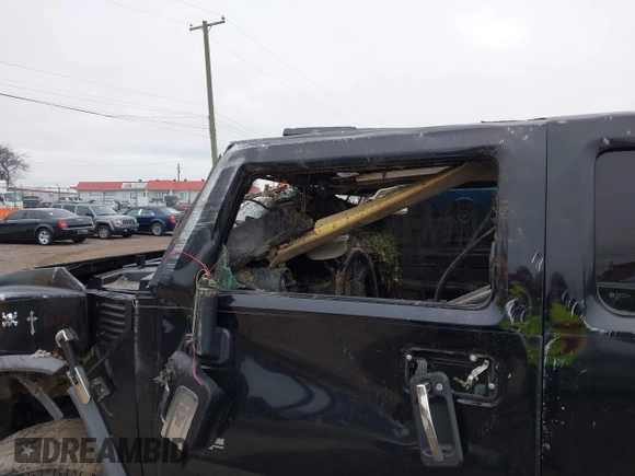 2007 Hummer H2 SUV z VIN 5GRGN23UX7H111093, wystawiony jako IAAI lot #41262675 z przebiegiem Nie podano mil oraz . Historia ofert i sprzedaży dostępna na DreamBid. Obrazek 19.