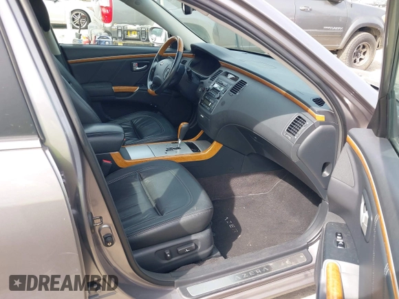 2007 Hyundai Azera SE z VIN KMHFC46F57A141280, wystawiony jako IAAI lot #42214462 z przebiegiem 105 476 mil mil oraz . Historia ofert i sprzedaży dostępna na DreamBid. Obrazek 5.