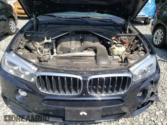 2017 BMW X5 xDrive35i with VIN 5UXKR0C37H0X80867, listed as a Copart auction lot 58697515 with 54,191 mi miles and Salvage title. Bid and sale history available at DreamBid. Image 12.