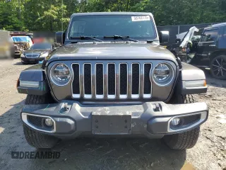 2018 Jeep Wrangler Unlimited Sahara with VIN 1C4HJXEGXJW229881, listed as a Copart auction lot 58762775 with 82,470 mi miles and Salvage title. Bid and sale history available at DreamBid. Image 5.