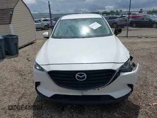 2016 Mazda CX-9 Sport with VIN JM3TCABY4G0100620, listed as a IAAI auction lot 42316216 with 191,245 mi miles and . Bid and sale history available at DreamBid. Image 12.