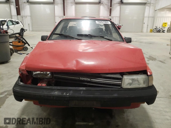 1989 Toyota Tercel z VIN JT2EL31DXK0410350, wystawiony jako Copart lot #79207084 z przebiegiem 189 827 mil mil oraz Szkoda całkowita • Salvage title. Historia ofert i sprzedaży dostępna na DreamBid. Obrazek 5.
