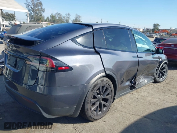 2023 Tesla Model X with VIN 7SAXCBE50PF378548, listed as a IAAI auction lot 41698357 with Not Provided miles and . Bid and sale history available at DreamBid. Image 4.