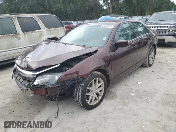 2012 Ford Fusion SEL z VIN 3FAHP0JA5CR184593, wystawiony jako Copart lot #61647265 z przebiegiem 127 720 mil mil oraz Szkoda całkowita • Salvage title. Historia ofert i sprzedaży dostępna na DreamBid. Obrazek 1.