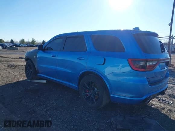 2018 Dodge Durango SRT z VIN 1C4SDJGJ1JC415720, wystawiony jako IAAI lot #41193674 z przebiegiem 63 140 mil mil oraz . Historia ofert i sprzedaży dostępna na DreamBid. Obrazek 3.