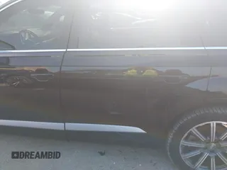 2018 Audi Q7 Premium Plus z VIN WA1LAAF75JD054810, wystawiony jako IAAI lot #42049892 z przebiegiem 43 297 mil mil oraz . Historia ofert i sprzedaży dostępna na DreamBid. Obrazek 14.