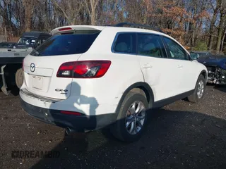 2015 Mazda CX-9 Touring with VIN JM3TB3CV0F0465622, listed as a IAAI auction lot 40955697 with 29,792 mi miles. Bid and sale history available at carsss.com. Image 4.
