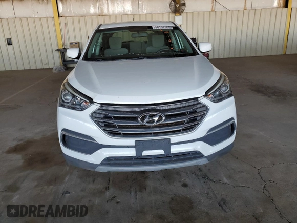 2018 Hyundai Santa Fe 2.4L z VIN 5XYZTDLB2JG550539, wystawiony jako Copart lot #58232955 z przebiegiem 125 810 mil mil oraz Czysty tytuł • Clean title. Historia ofert i sprzedaży dostępna na DreamBid. Obrazek 5.