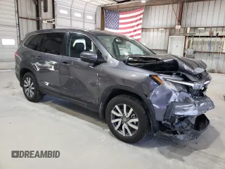 2021 Honda Pilot EX-L with VIN 5FNYF6H53MB044294, listed as a Copart auction lot 57799975 with 59,033 mi miles and Salvage title. Bid and sale history available at DreamBid. Image 4.