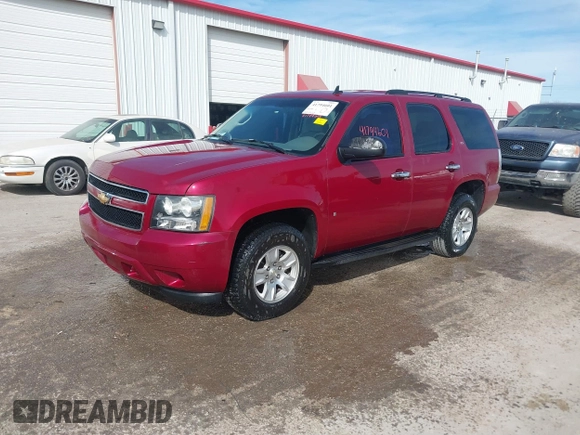 2007 Chevrolet Tahoe LT with VIN 1GNFC13J47R215812, listed as a IAAI auction lot 41794601 with 229,970 mi miles and . Bid and sale history available at DreamBid. Image 2.