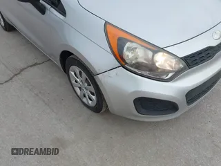 2013 Kia Rio LX with VIN KNADM5A30D6226681, listed as a IAAI auction lot 41657362 with 127,569 mi miles. Bid and sale history available at carsss.com. Image 6.