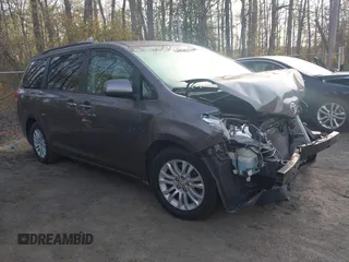 2011 Toyota Sienna XLE AAS with VIN 5TDYK3DC2BS093980, listed as a IAAI auction lot 42064568 with 196,893 mi miles. Bid and sale history available at carsss.com. Image 1.
