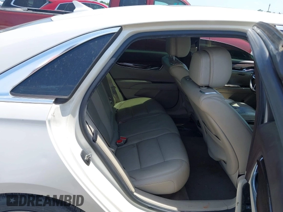 2013 Cadillac XTS Premium z VIN 2G61S5S33D9235025, wystawiony jako IAAI lot #42288742 z przebiegiem 180 221 mil mil oraz . Historia ofert i sprzedaży dostępna na DreamBid. Obrazek 8.