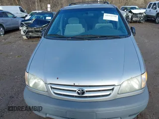 2003 Toyota Sienna CE with VIN 4T3ZF19C33U553315, listed as a IAAI auction lot 41212999 with 274,331 mi miles. Bid and sale history available at carsss.com. Image 6.