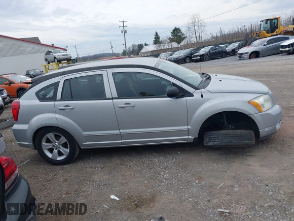 2011 Dodge Caliber Mainstreet with VIN 1B3CB3HA2BD238032, listed as a IAAI auction lot 41865918 with 98,022 mi miles and . Bid and sale history available at DreamBid. Image 13.