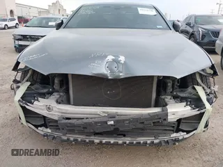 2018 BMW 5 Series M550i xDrive with VIN WBAJB9C55JB035694, listed as a IAAI auction lot 42122730 with 61,561 mi miles and . Bid and sale history available at DreamBid. Image 6.