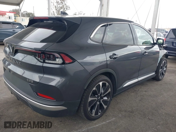 2023 VinFast VF 8 Plus z VIN RLLV1AFA9PH001464, wystawiony jako IAAI lot #41798776 z przebiegiem 2355 mil mil oraz . Historia ofert i sprzedaży dostępna na DreamBid. Obrazek 4.