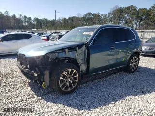2024 BMW X5 sDrive40i with VIN 5UX13EU01R9S43357, listed as a Copart auction lot 46348935 with 11,451 mi miles and Salvage Title. Bid and sale history available at carsss.com. Image 1.